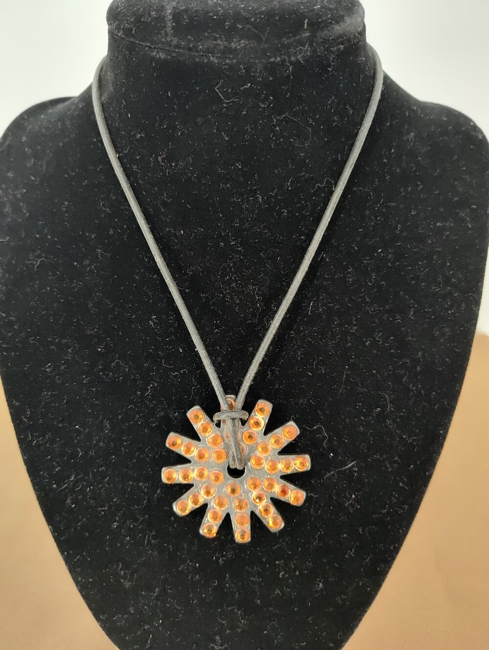 Cord Spur Rowel Necklace with Orange Sunburst Pendant